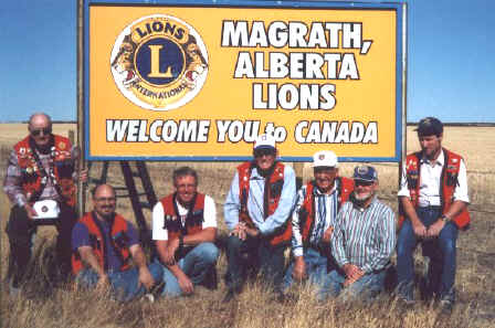 A pride of lions: Magrath Lions Club Members pose outside of Magrath, Alberta abt 2002